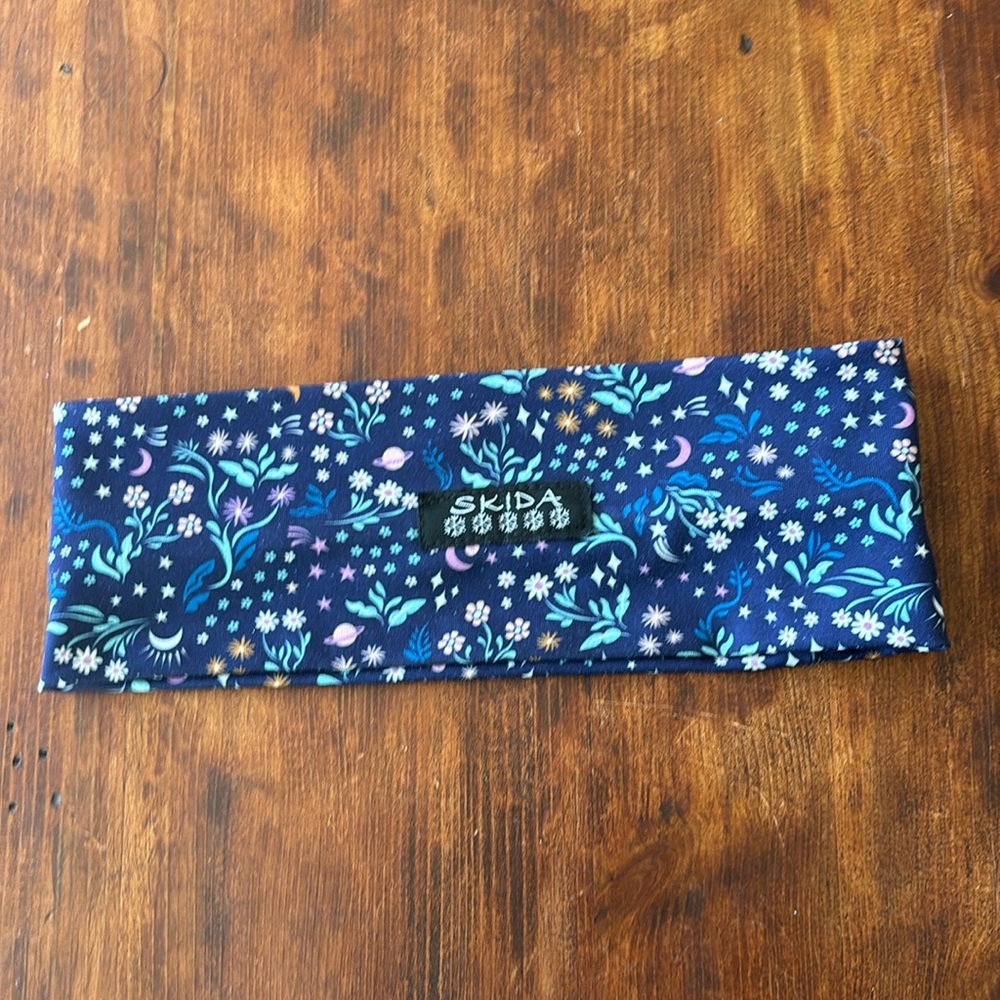 Woman’s Skida Headband. One Size. Color Space Garden.